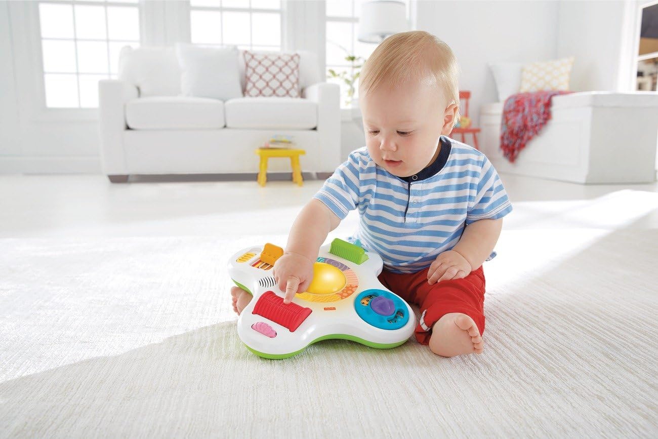 Fisher-Price Bright Beats Activity Center.