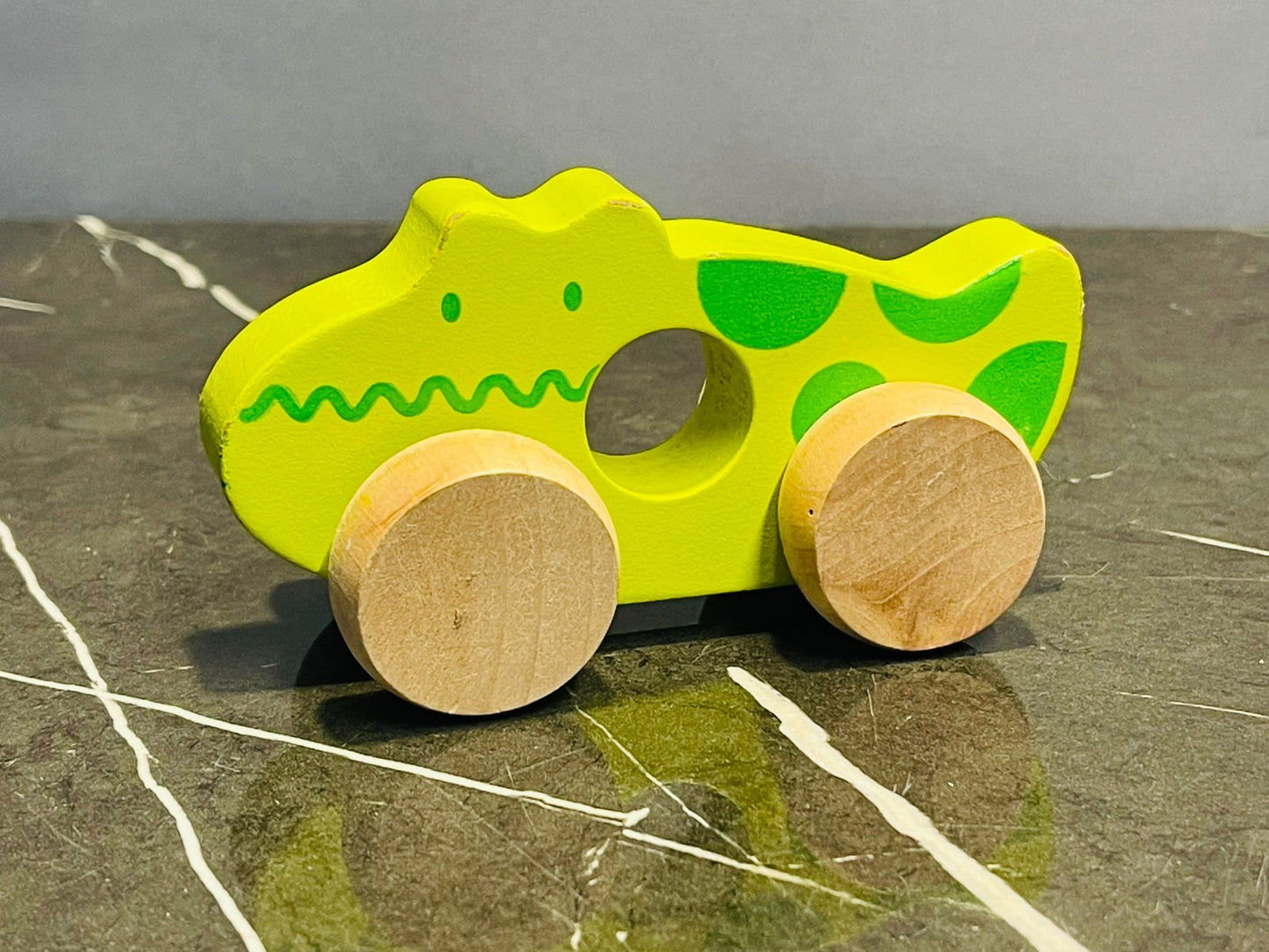 Wooden pull-along toy - crocodile.