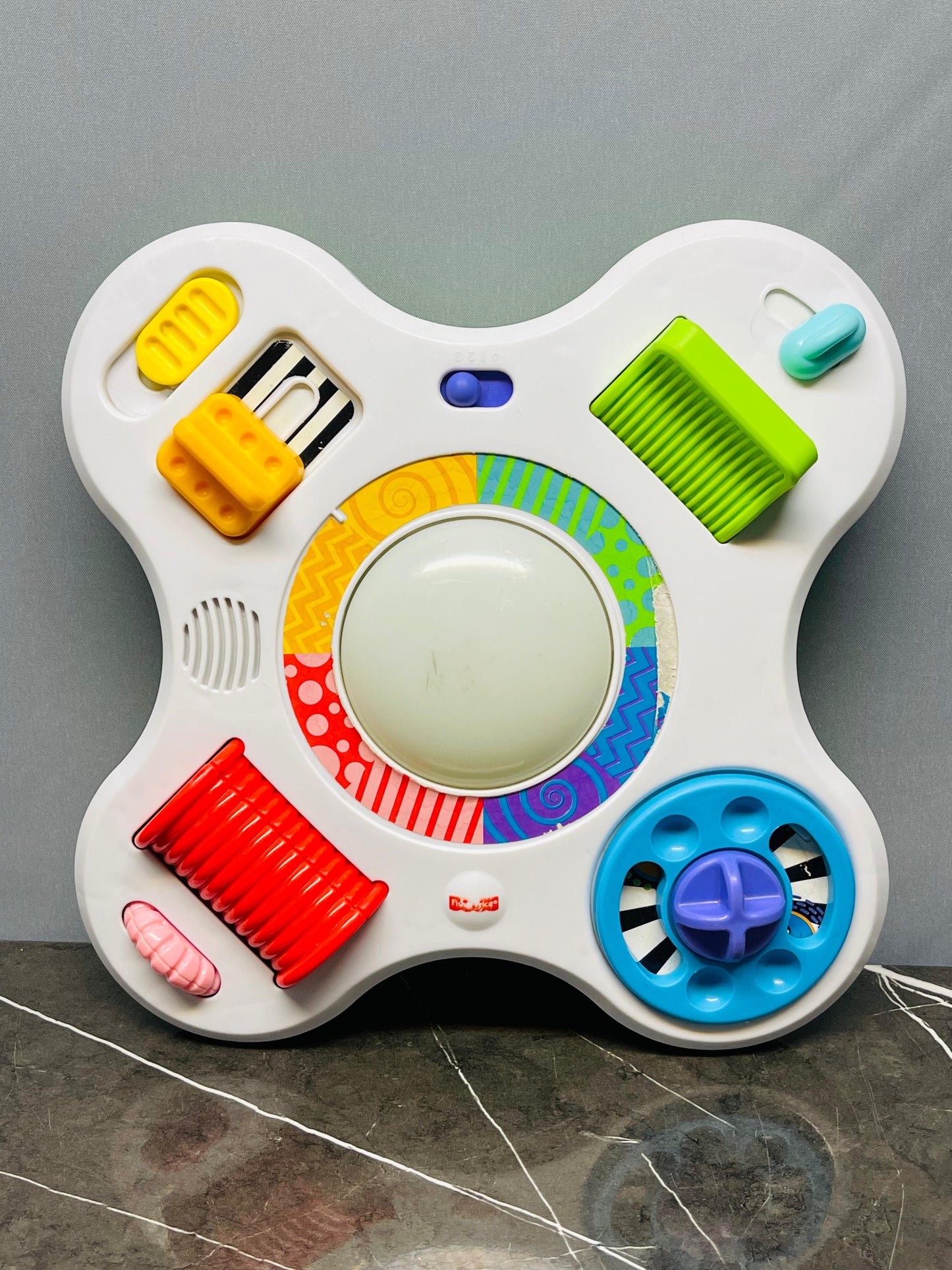 Fisher-Price Bright Beats Activity Center.
