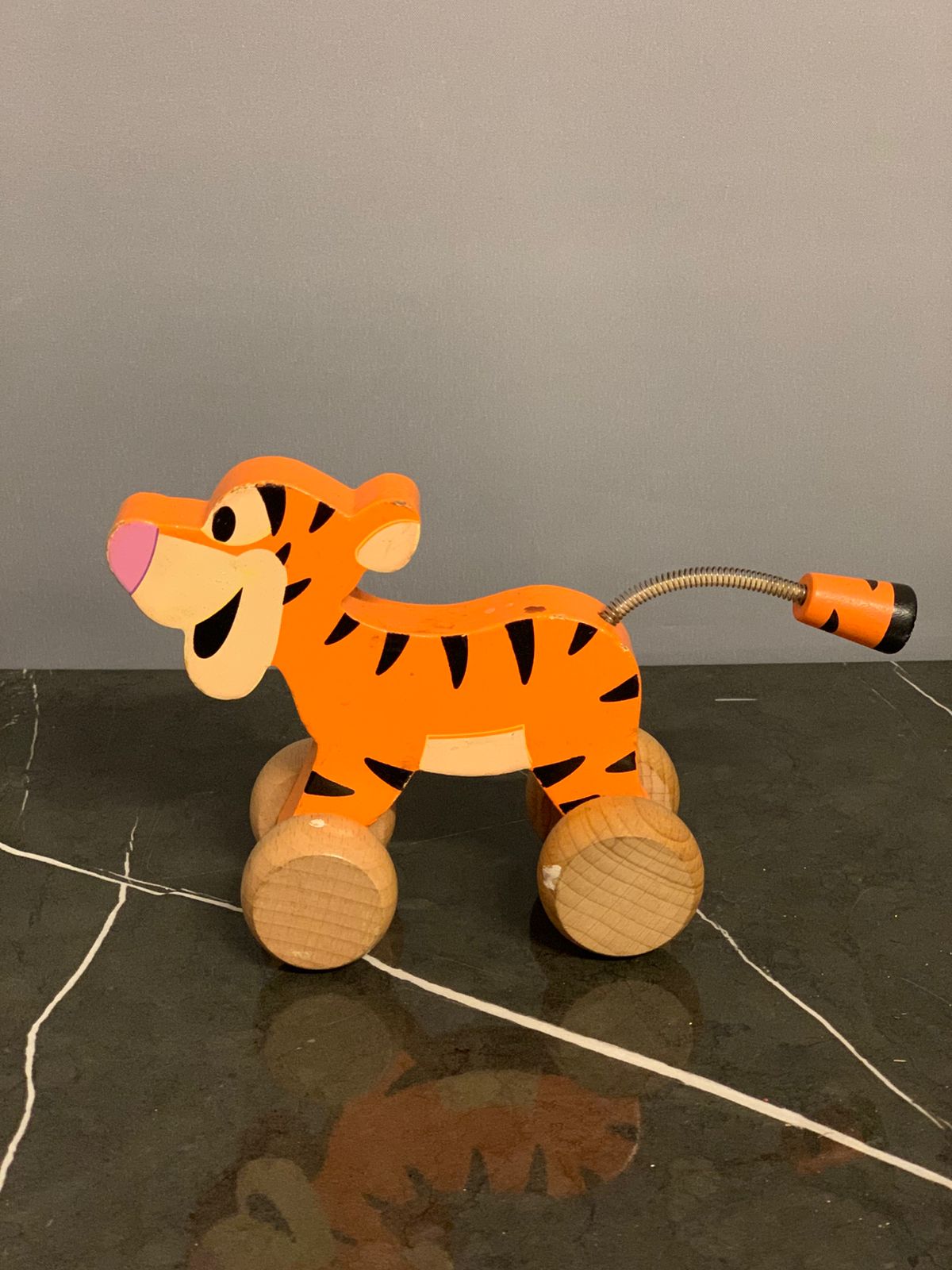 Disney Wooden Toys Tiger Clutch Toy.