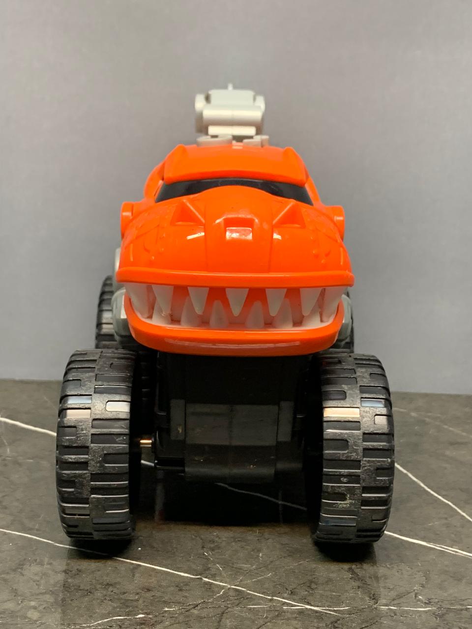 Roaring Adventures with the Dinosaur Monster Truck.