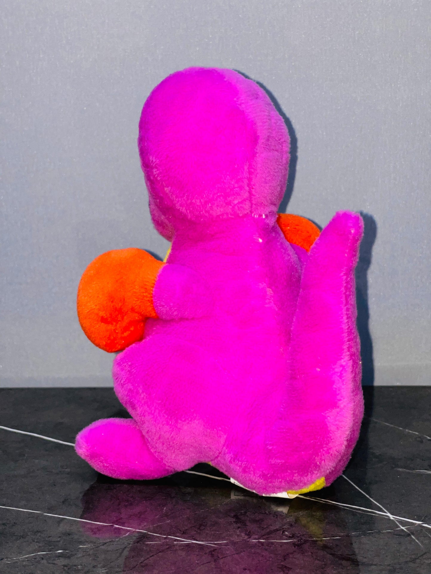 Cheerful Purple and Yellow Dino Plush