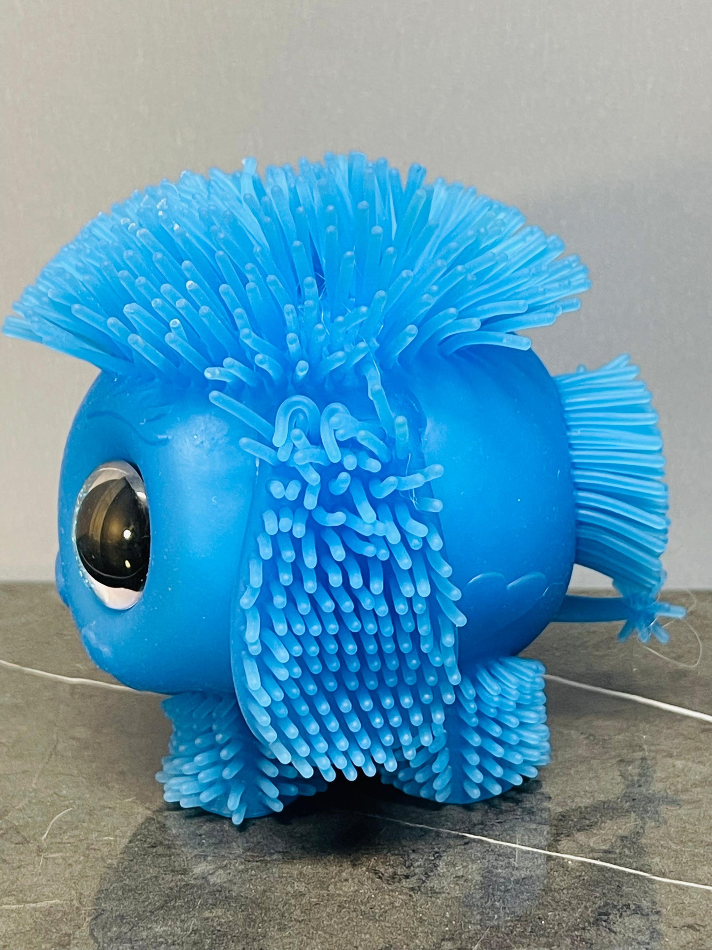 Googly-Eyed Spiky Creature Toy