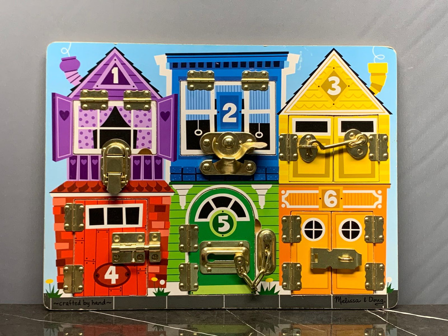 Melissa & Doug Wooden Latches Board. (500 advance)