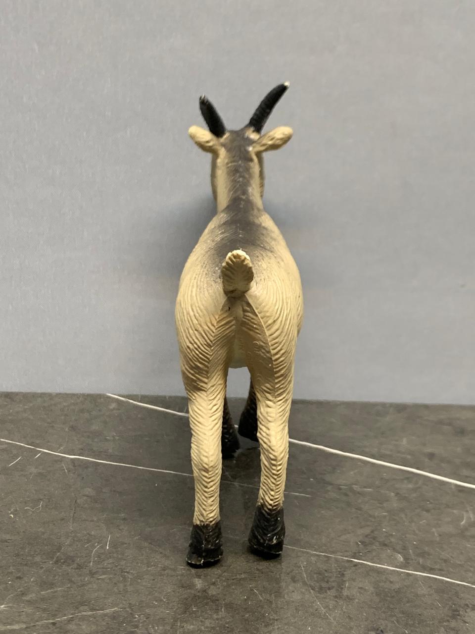 Realistic Goat Figurine.