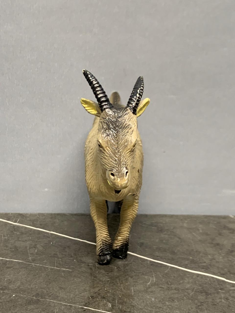 Realistic Goat Figurine.