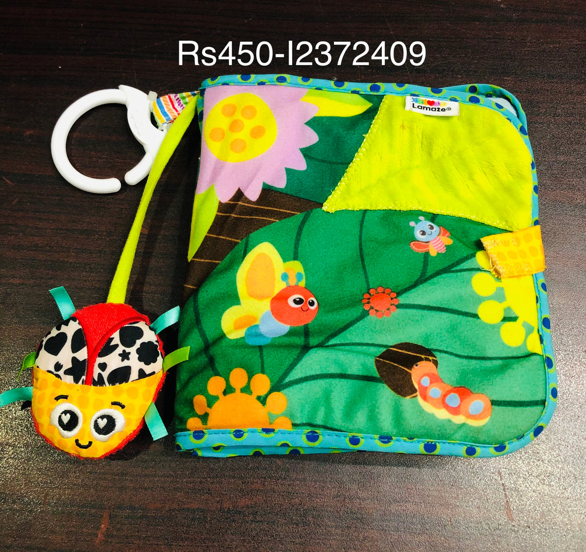 Lamaze soft crinkle book with flaps and mirror