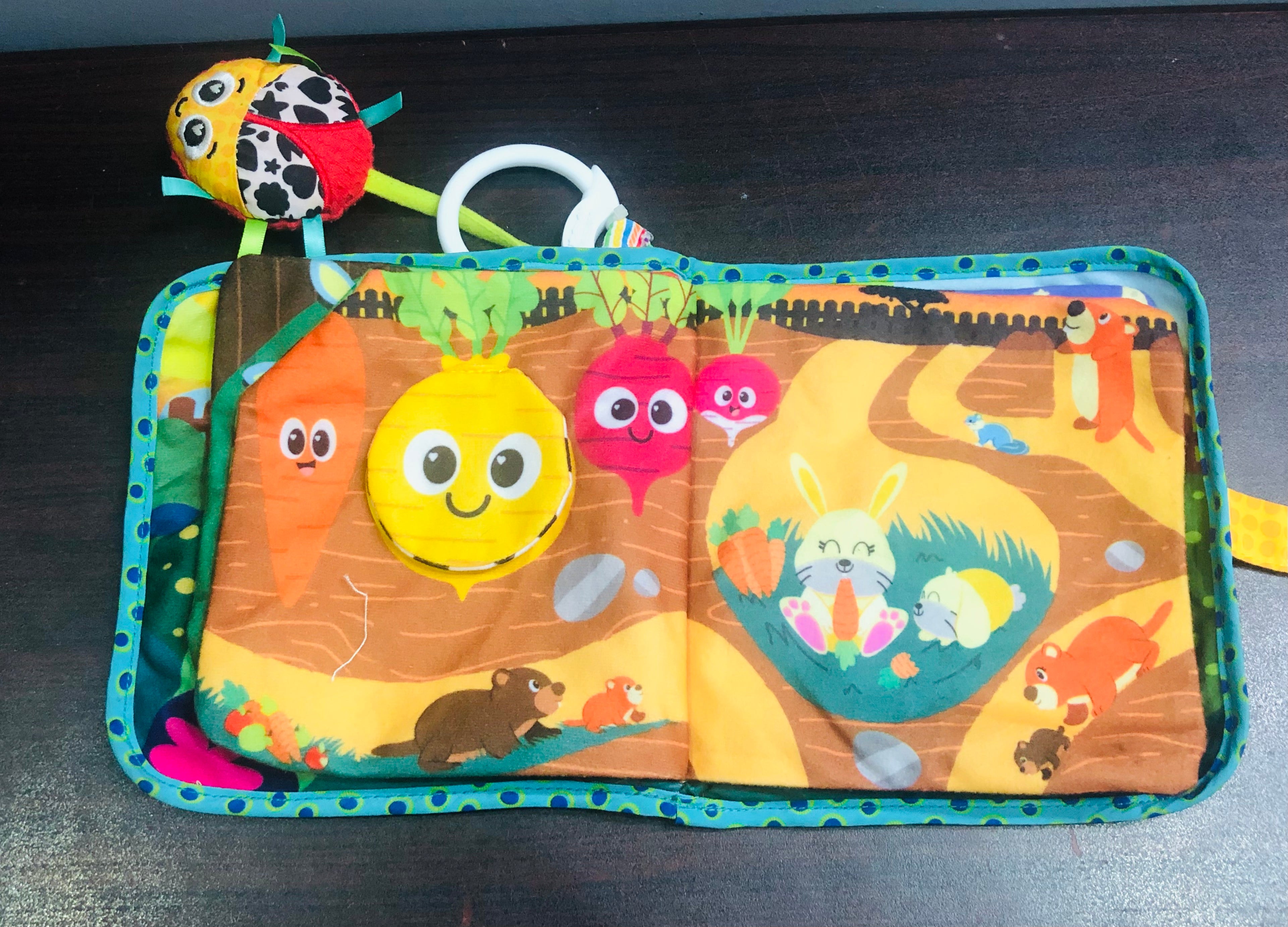 Lamaze soft crinkle book with flaps and mirror