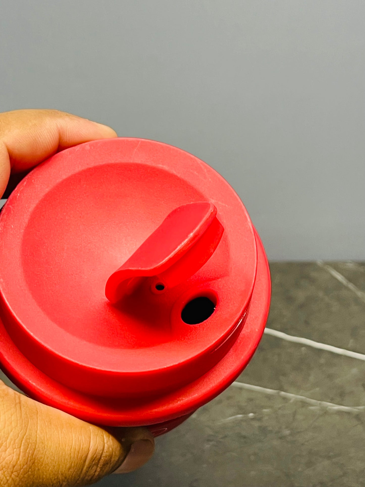 reusable coffee cup with a lid