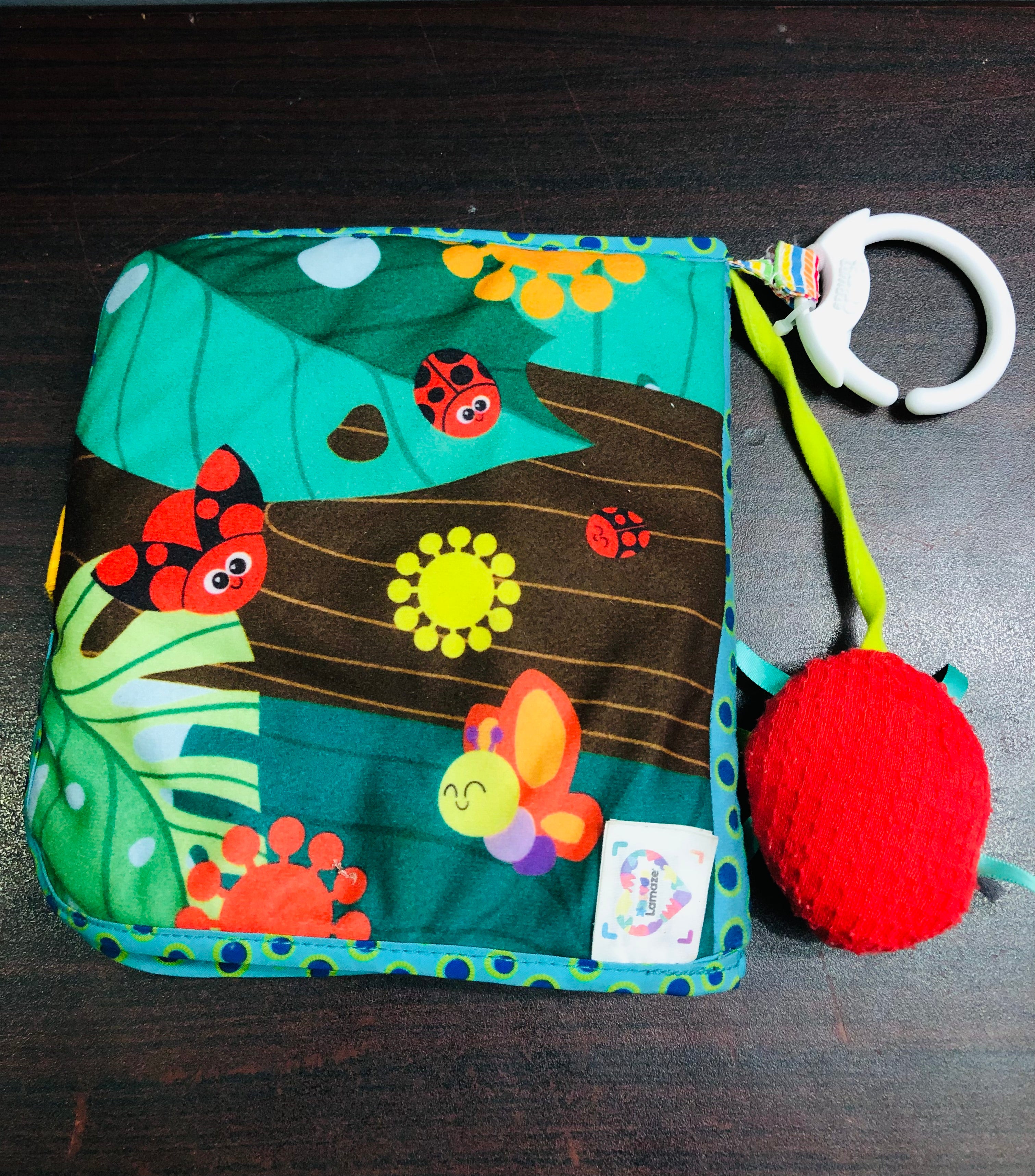 Lamaze soft crinkle book with flaps and mirror