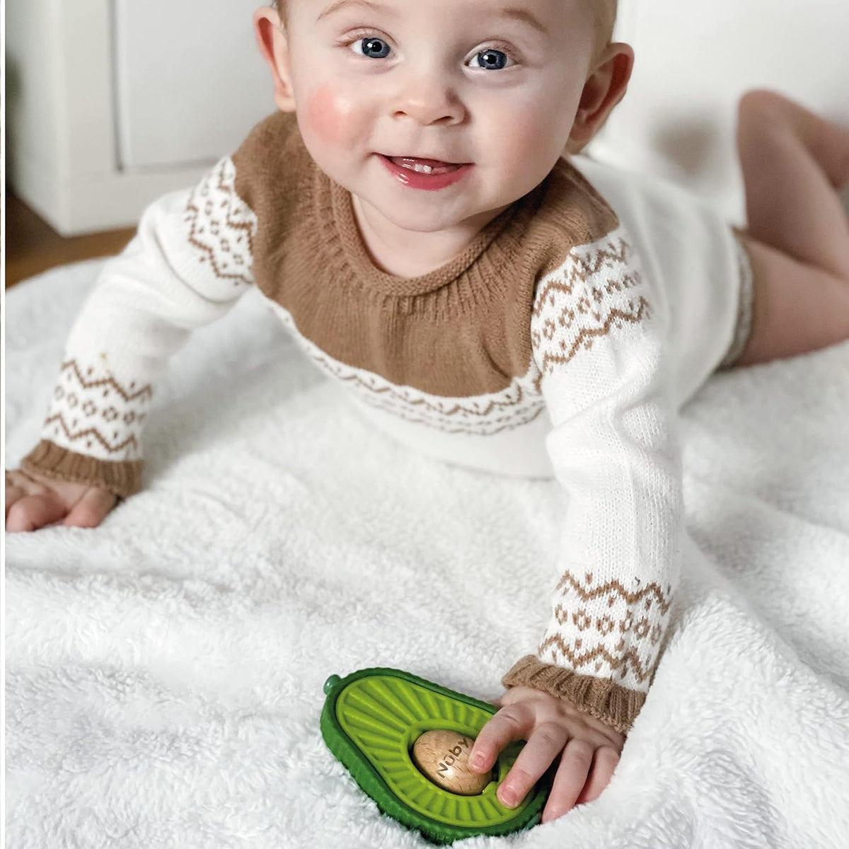 Nuby Avocado Muncher Wood and Silicone Teether.(Rs 100 advance)