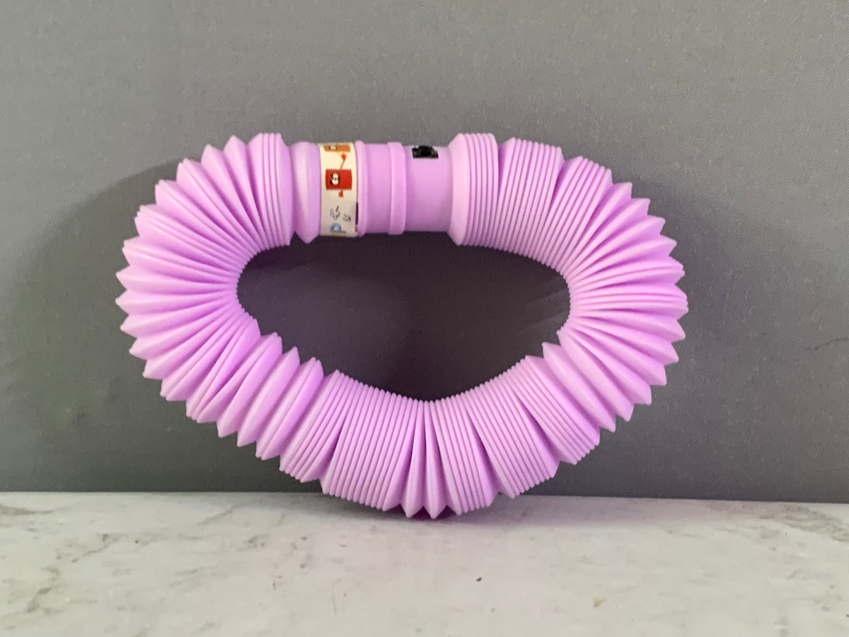 Light-Up Pop Tube Fidget Toy.(Rs 150 advance)(Assorted Colors)