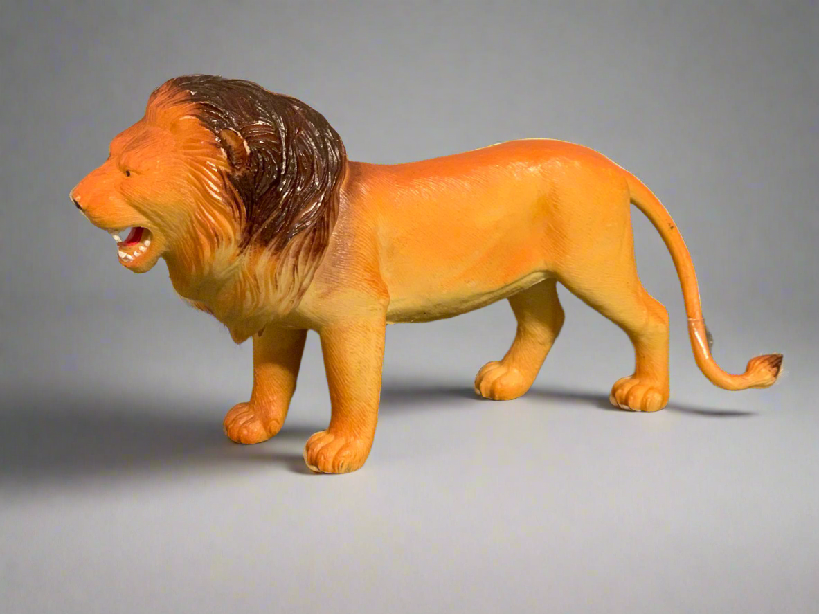 Realistic Plastic Lion Figure.