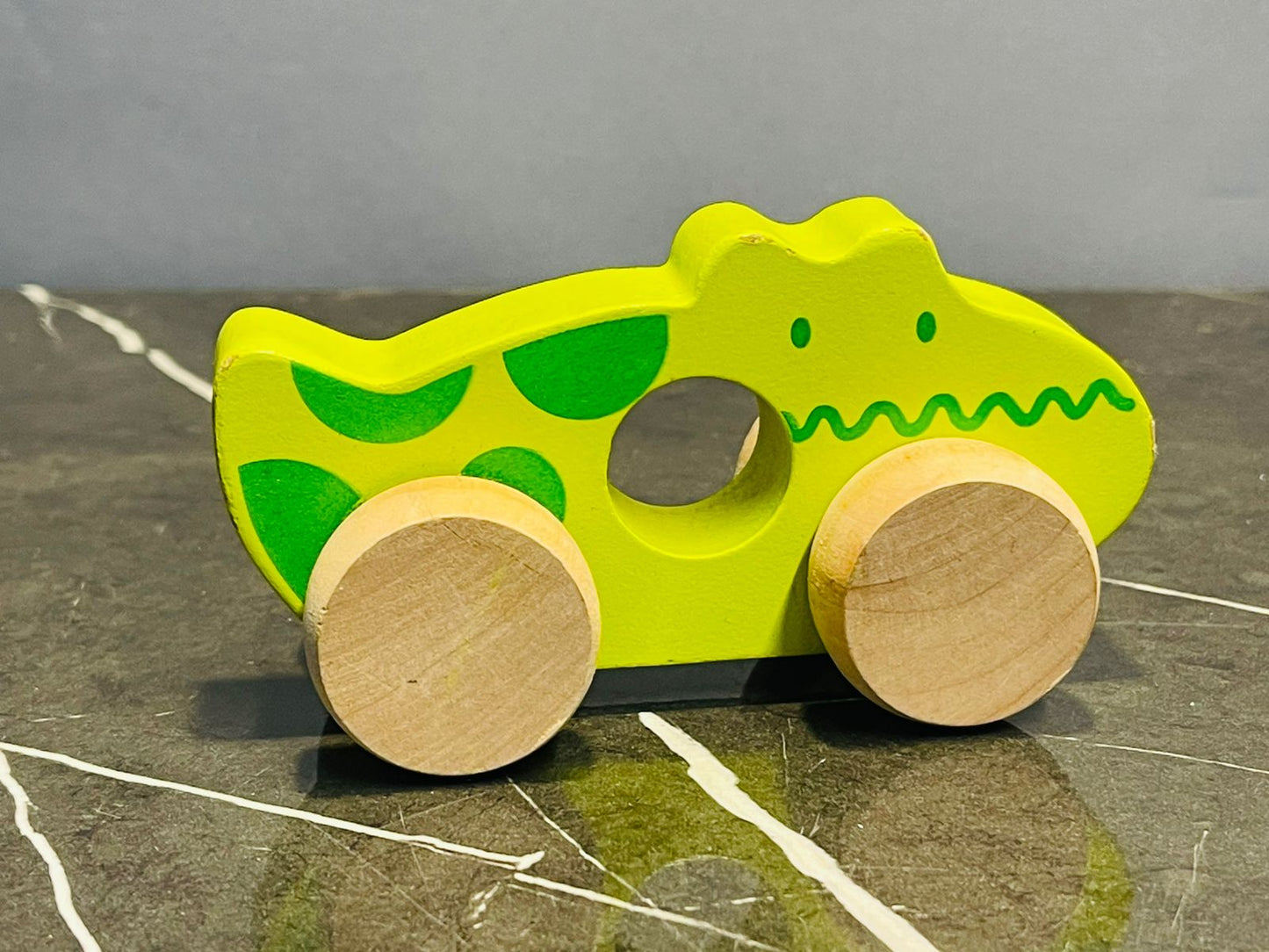 Wooden pull-along toy - crocodile.