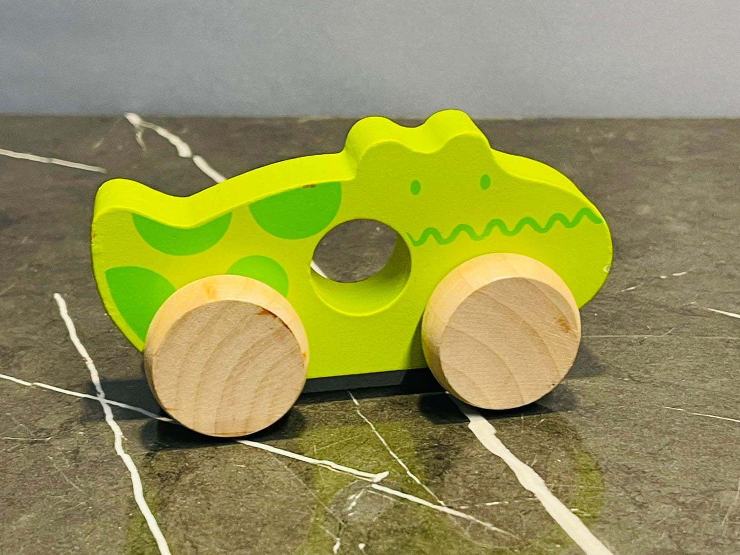 Wooden pull-along toy - crocodile.