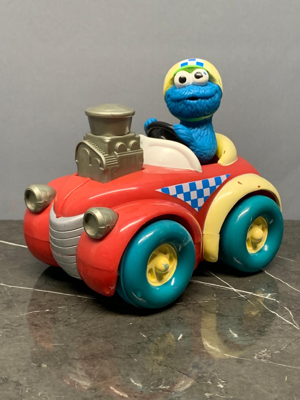 Vintage Cookie Monster Race Car Toy.
