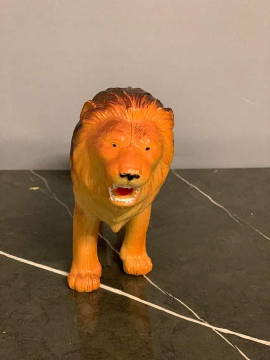 Realistic Plastic Lion Figure.