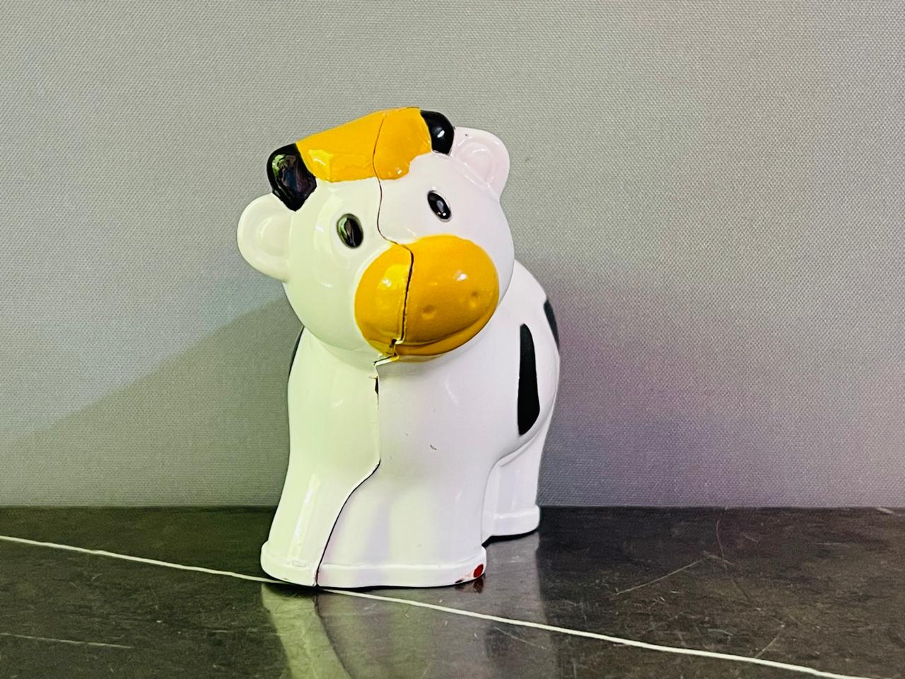 Cow Figurine.