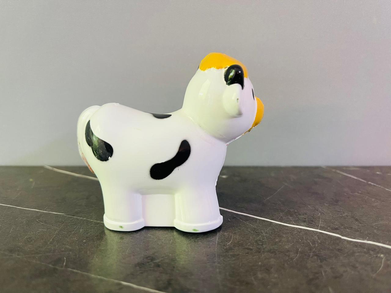 Cow Figurine.