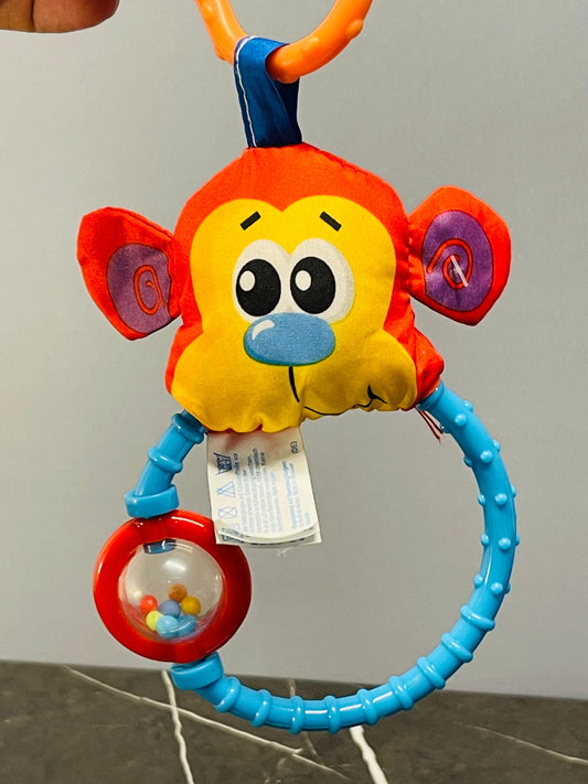 Playgro Dingly Dangly Curly the Monkey.