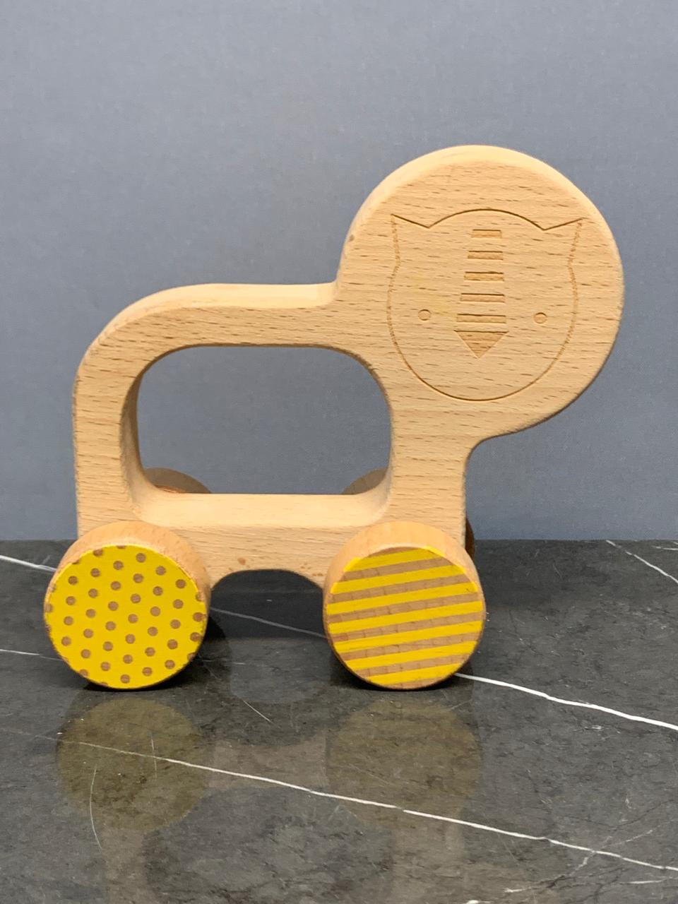 Petit Collage Lion Wooden Push Toy.