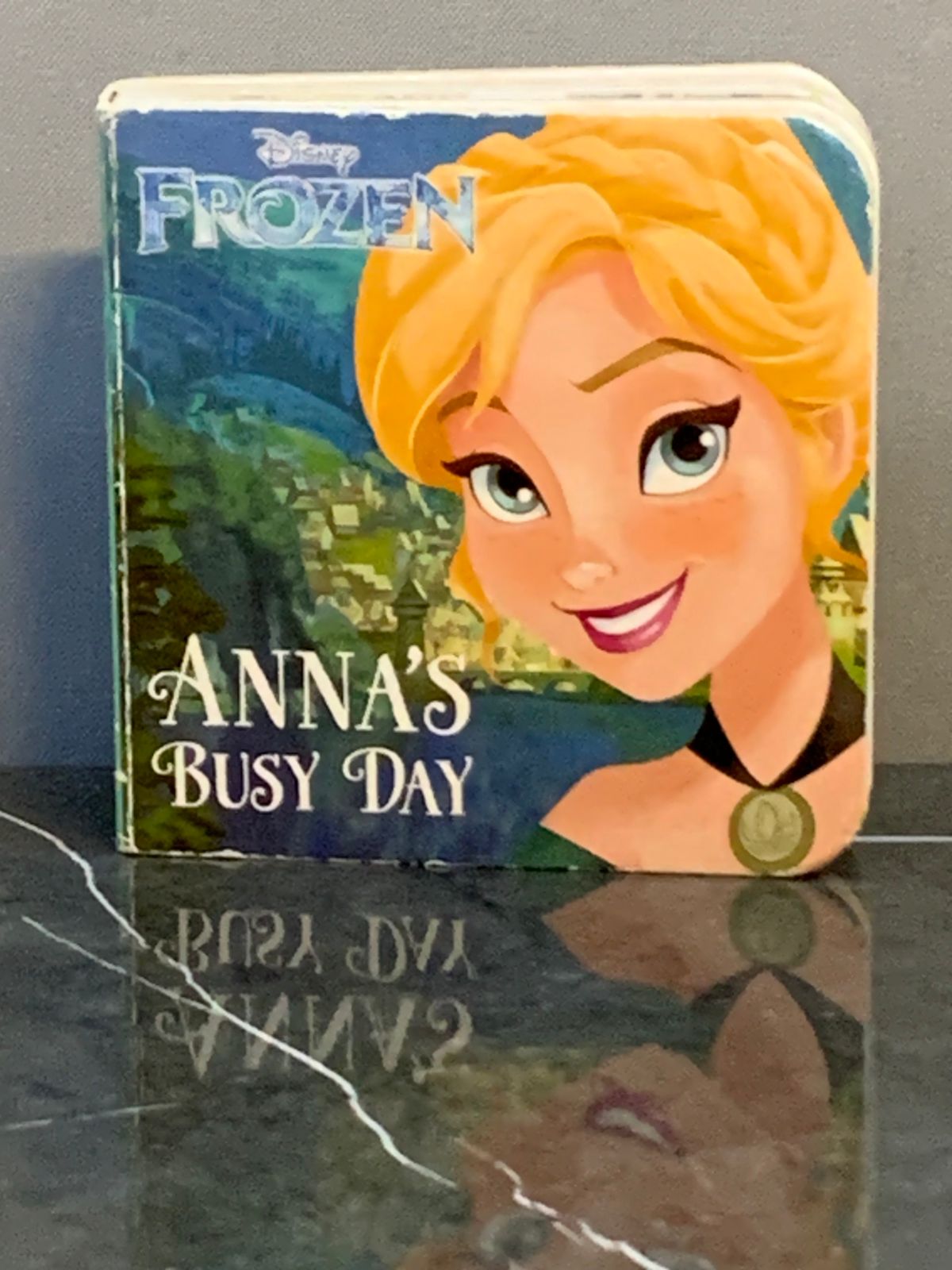 Disney Frozen board book, "Anna's Busy Day".