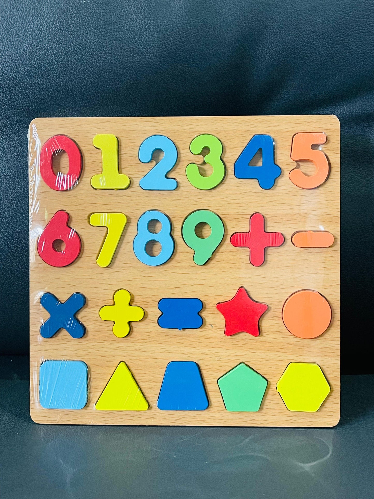 Numeric And Shapes Wooden Puzzle Board.