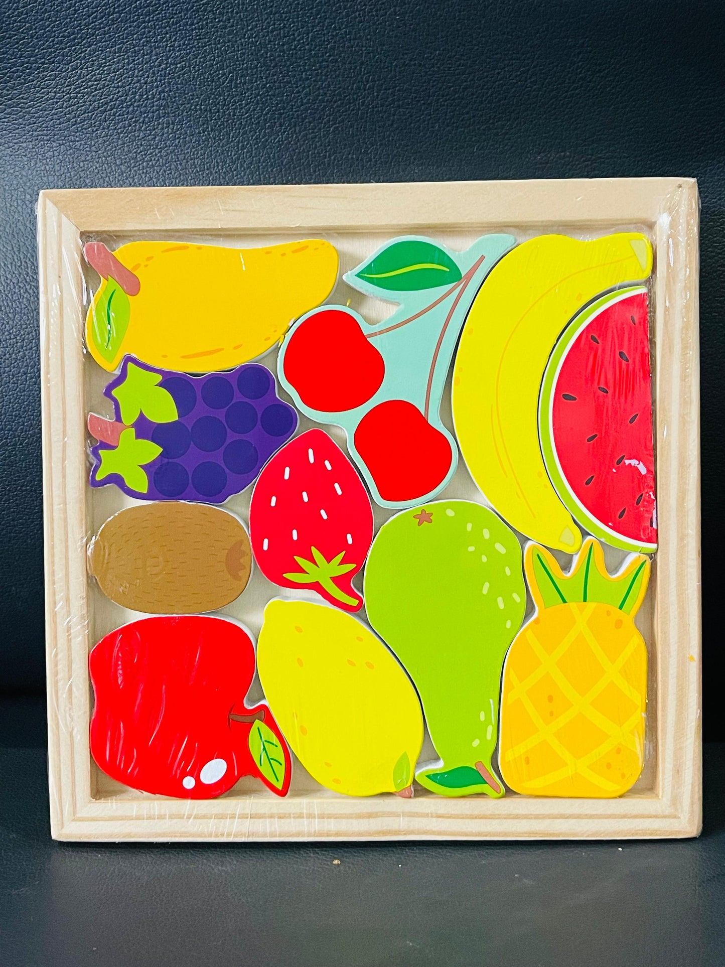 Wooden educational puzzle with shapes and colors