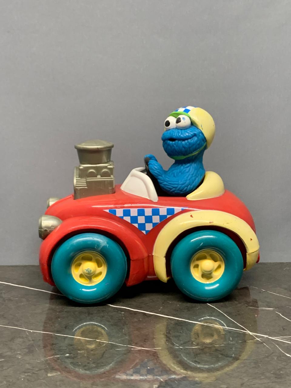 Vintage Cookie Monster Race Car Toy.