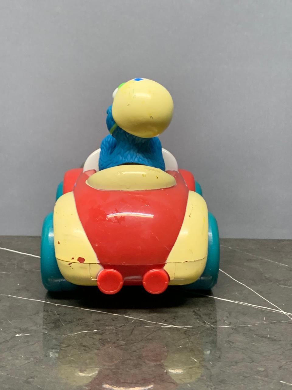 Vintage Cookie Monster Race Car Toy.