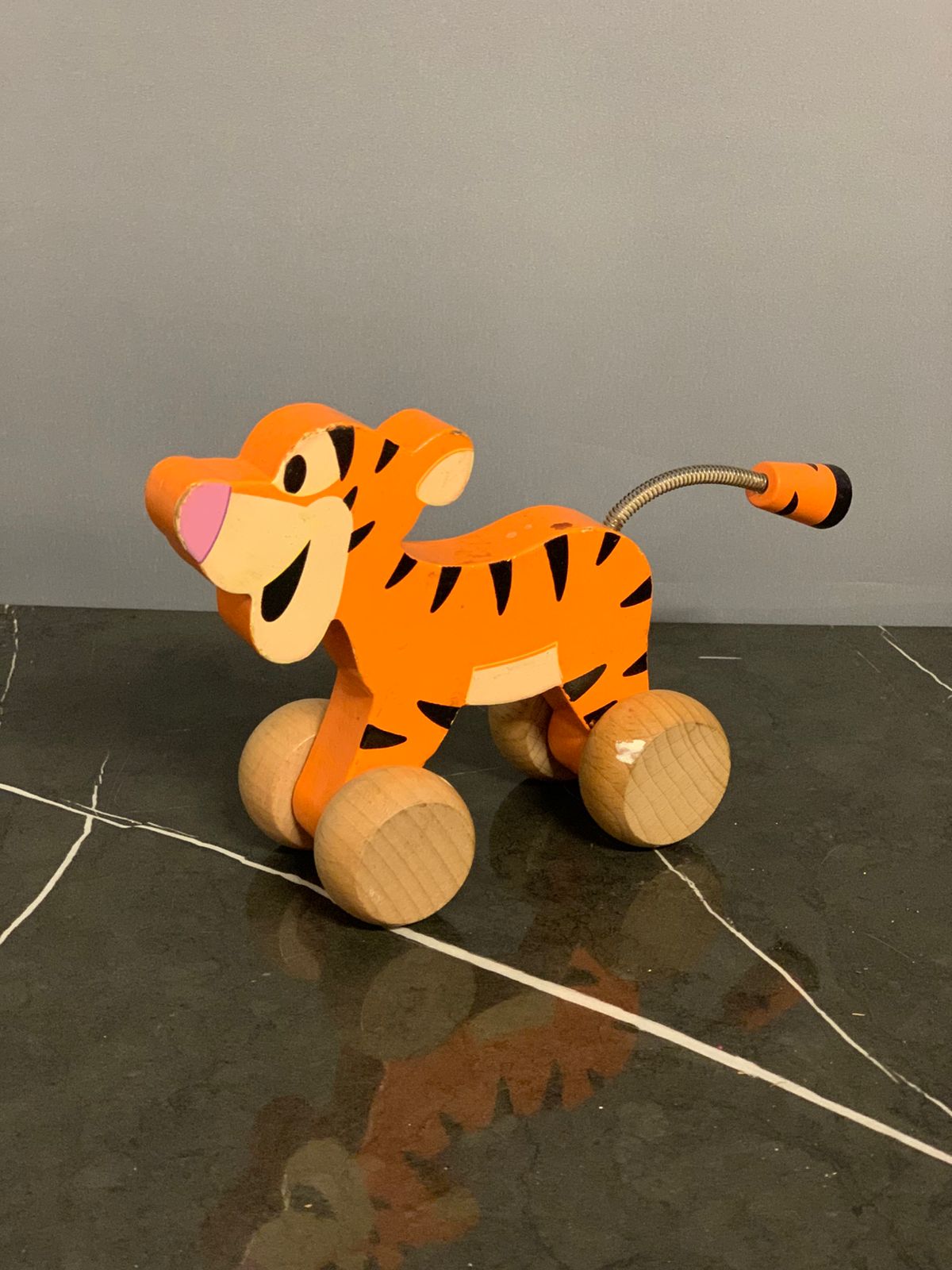 Disney Wooden Toys Tiger Clutch Toy.