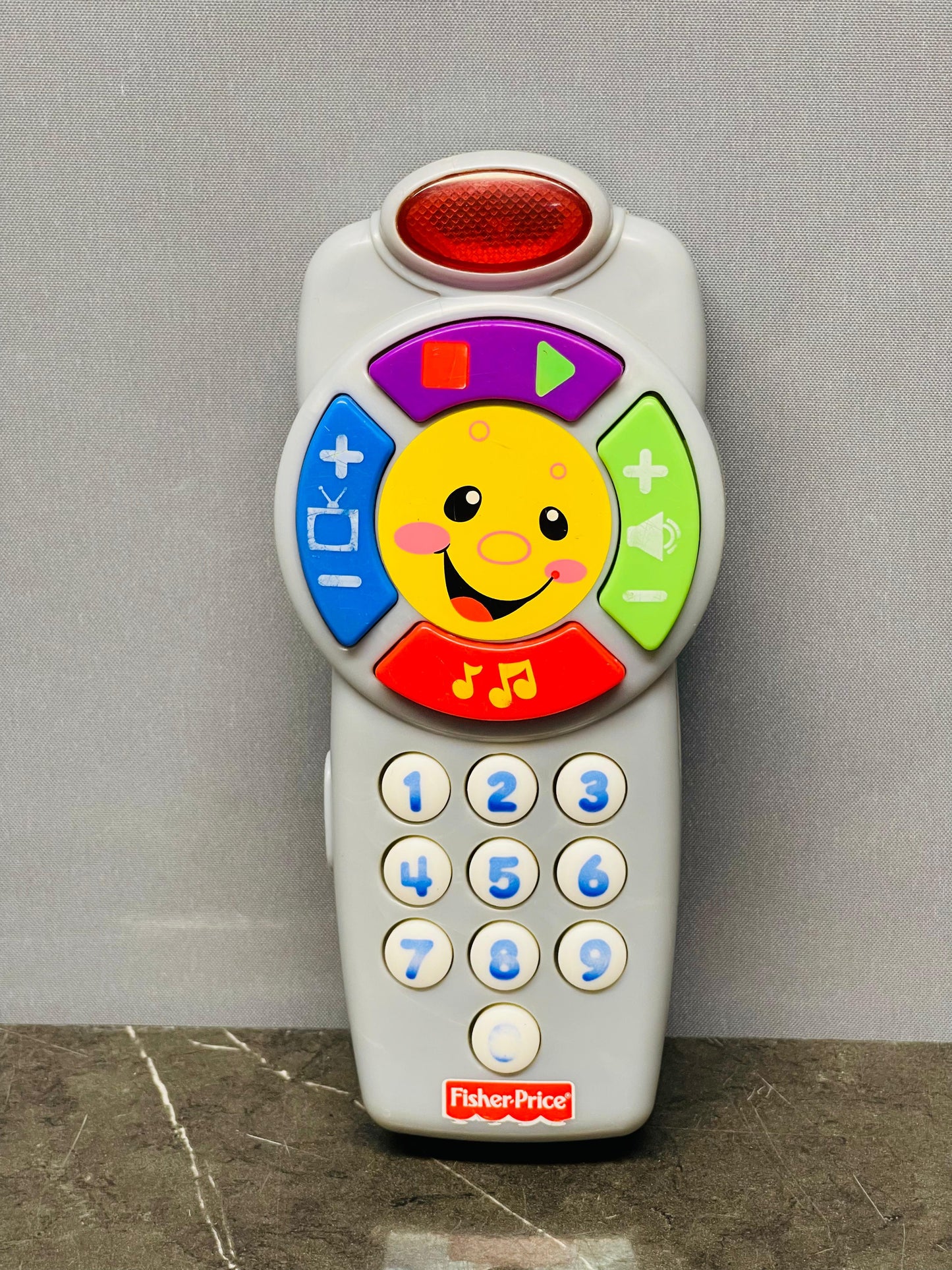 Fisher-Price Laugh & Learn Click 'n Learn Remote. SKU:BXL-050