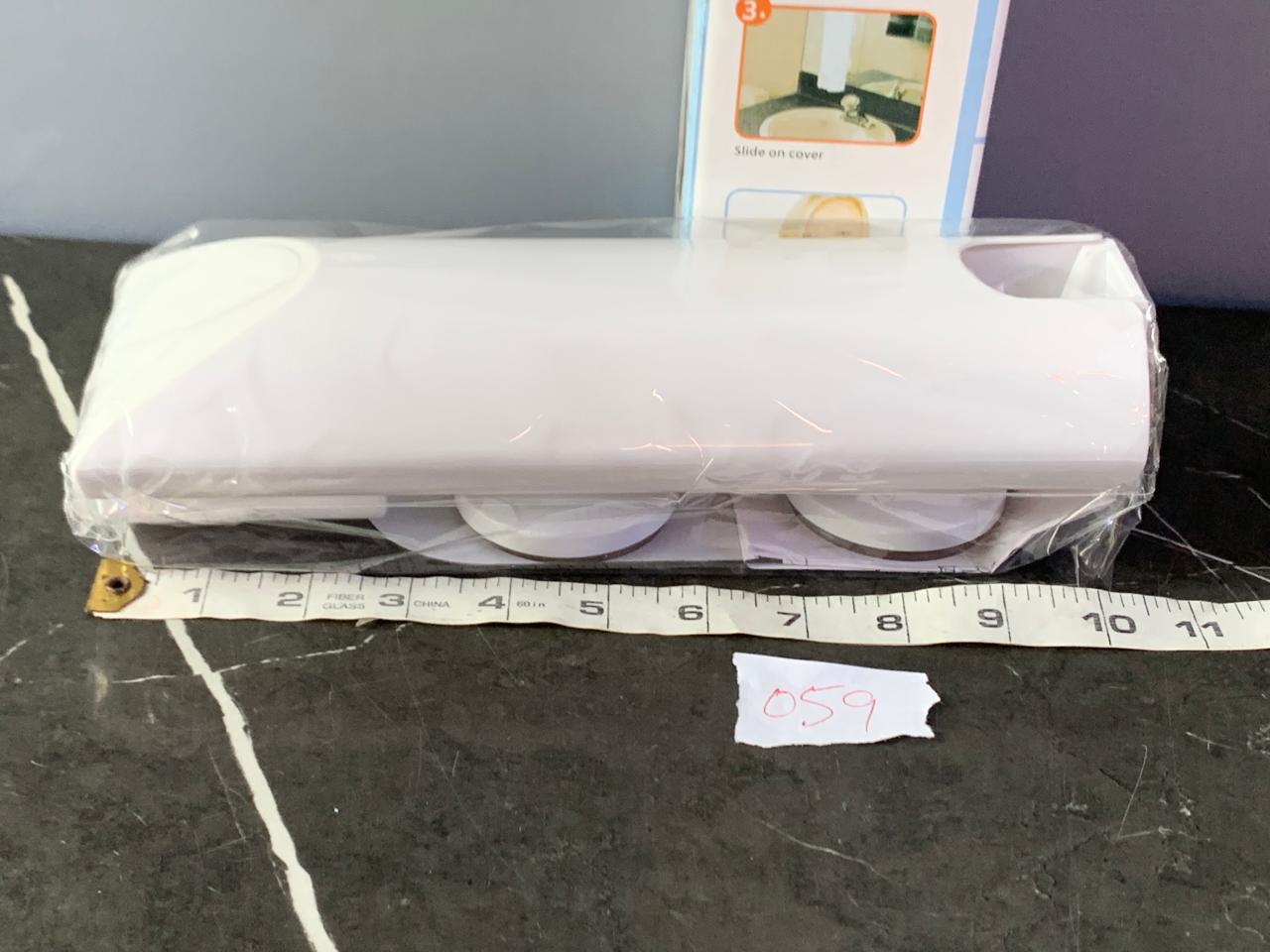 Touch N Brush Hands-free Toothpaste Dispenser. SKU:BXL-059 (new) (Rs 300 advance)