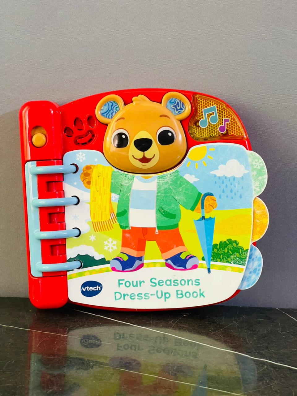 VTech Baby Four Seasons Dress-Up Book. SKU:BXL-066