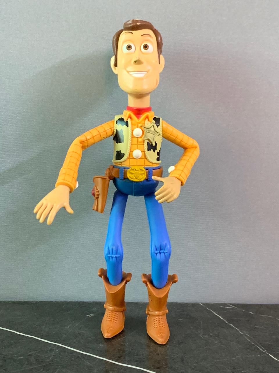 Toy Story Deluxe Woody Figurine.