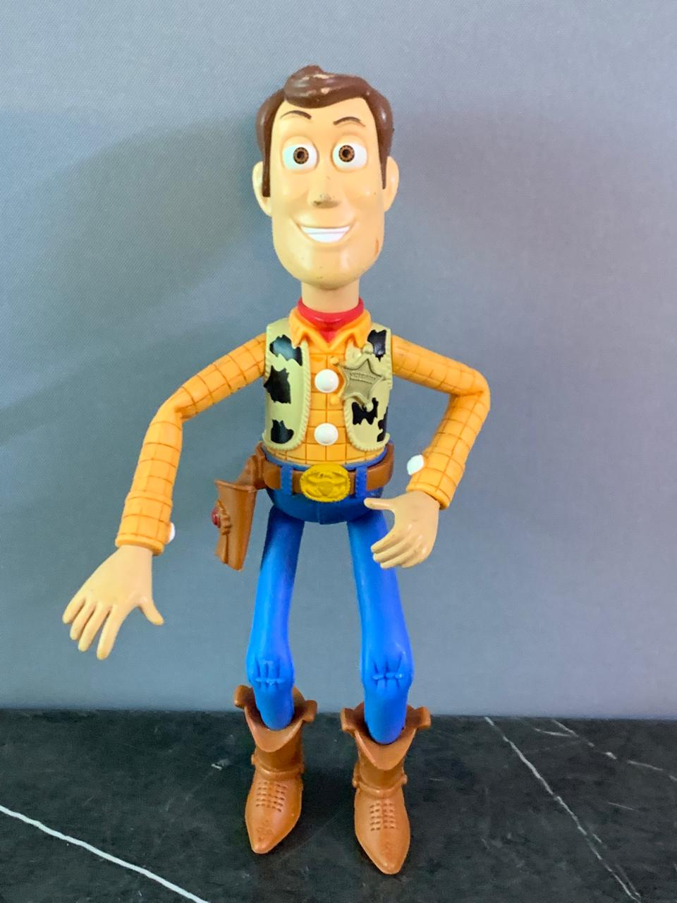 Toy Story Deluxe Woody Figurine.