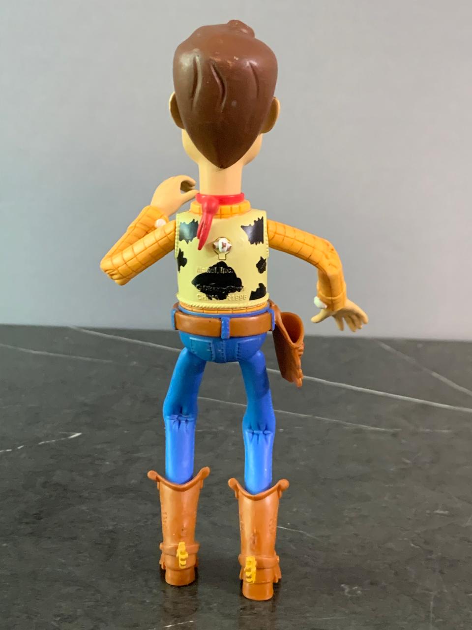Toy Story Deluxe Woody Figurine.