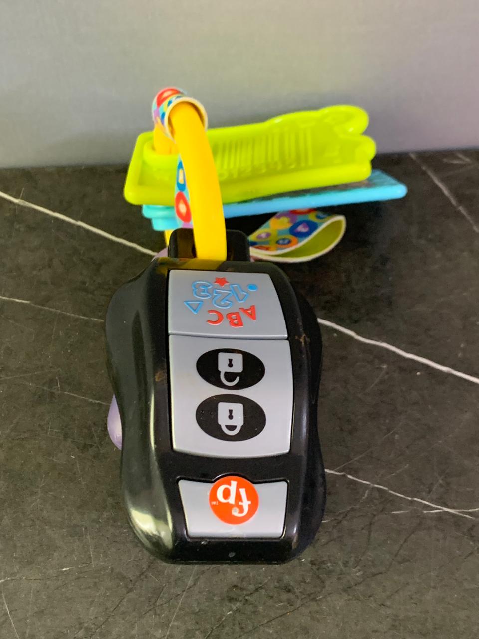Fisher-Price Laugh & Learn Baby Musical Toy Play & Go Activity Keys. (need new batteries )
