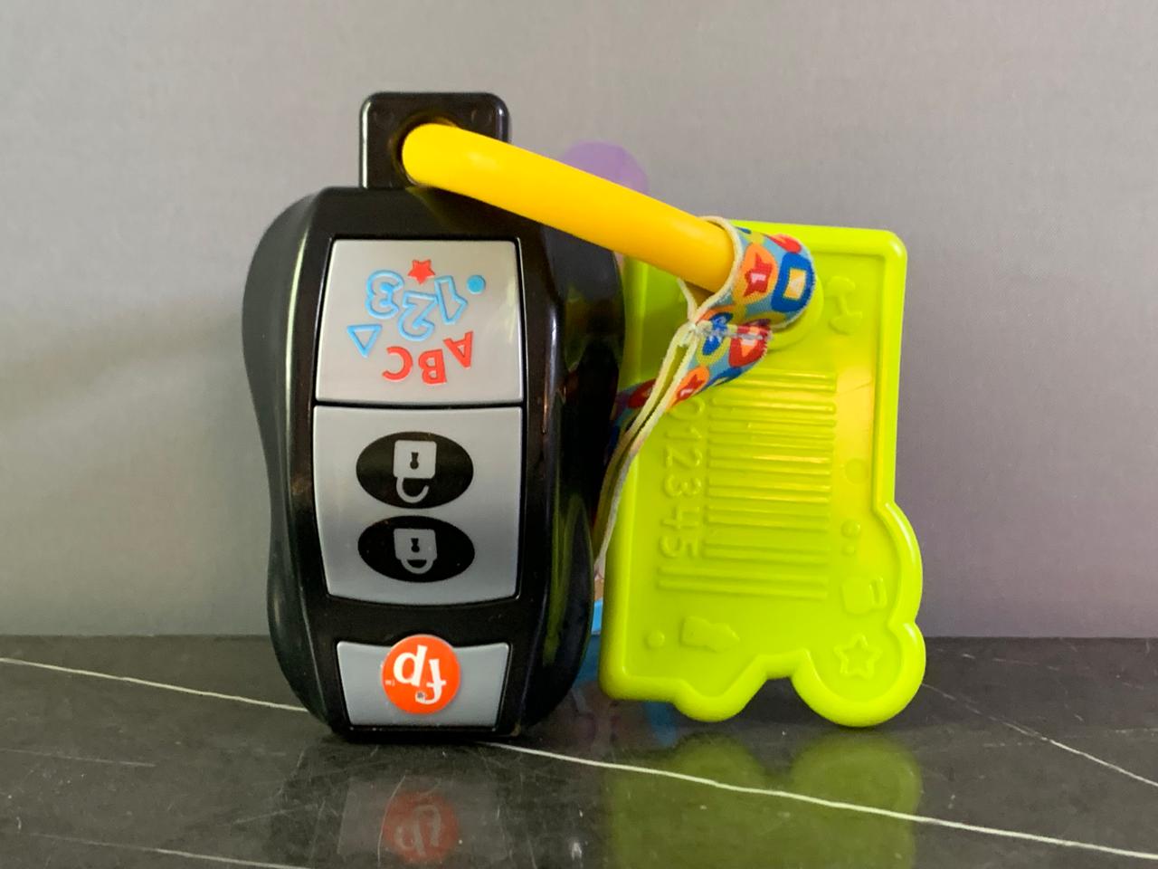 Fisher-Price Laugh & Learn Baby Musical Toy Play & Go Activity Keys. (need new batteries )