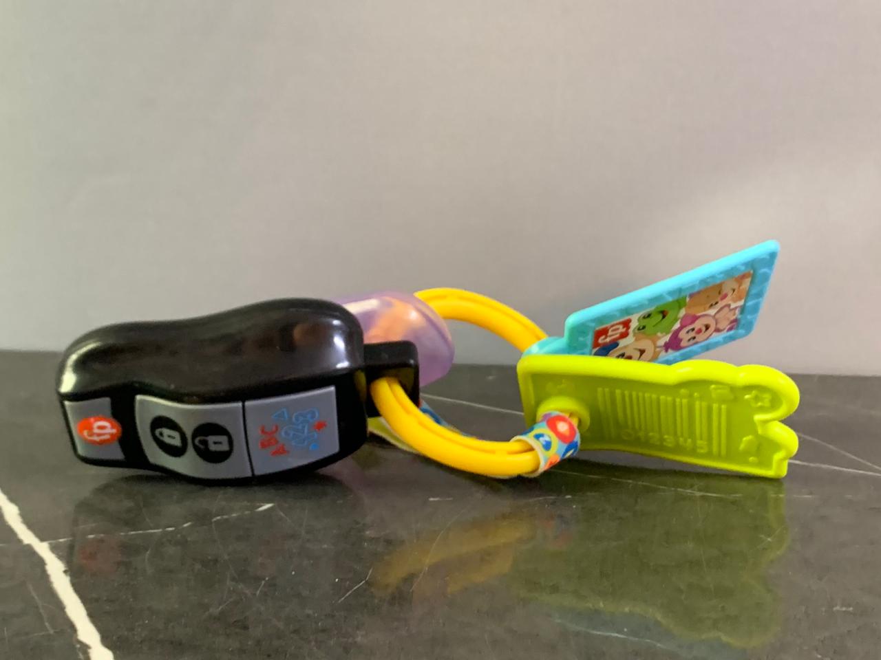 Fisher-Price Laugh & Learn Baby Musical Toy Play & Go Activity Keys. (need new batteries )