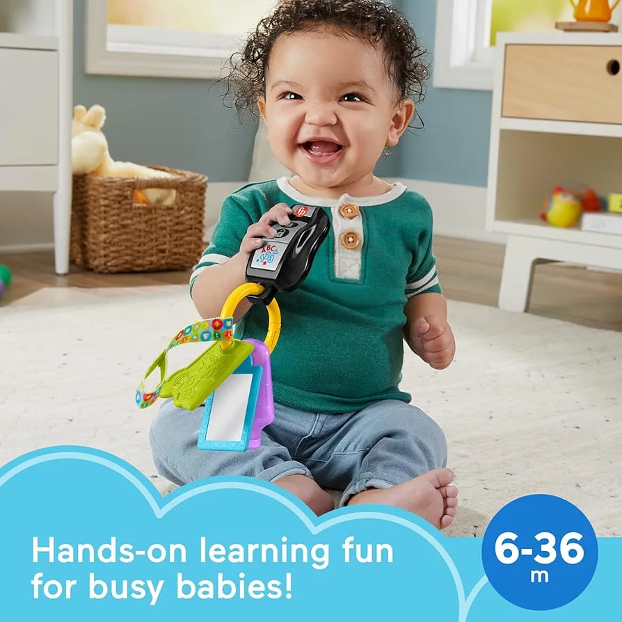 Fisher-Price Laugh & Learn Baby Musical Toy Play & Go Activity Keys. (need new batteries )