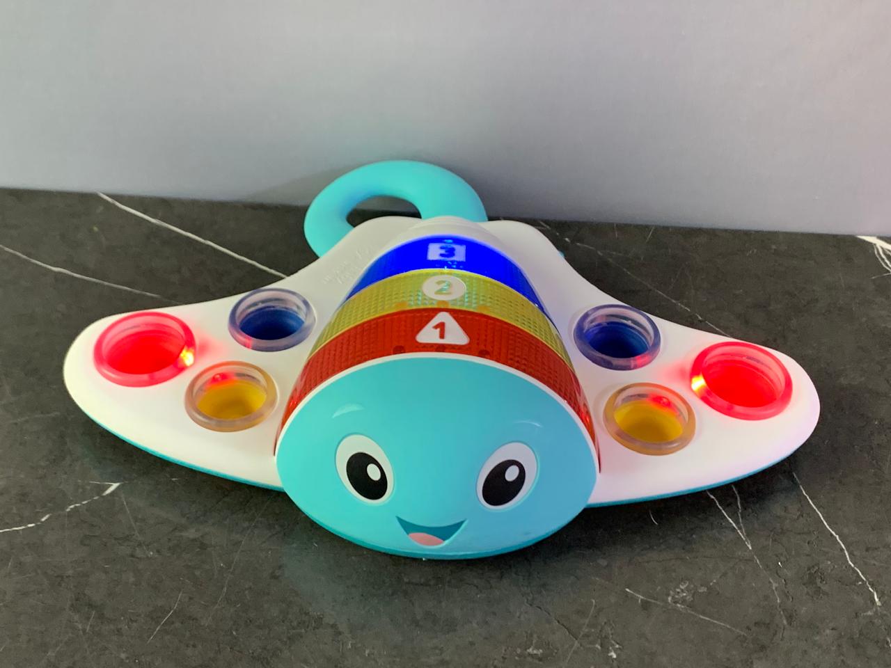 Baby Einstein Ocean Explorers Pop & Explore Stingray Popper Toy.