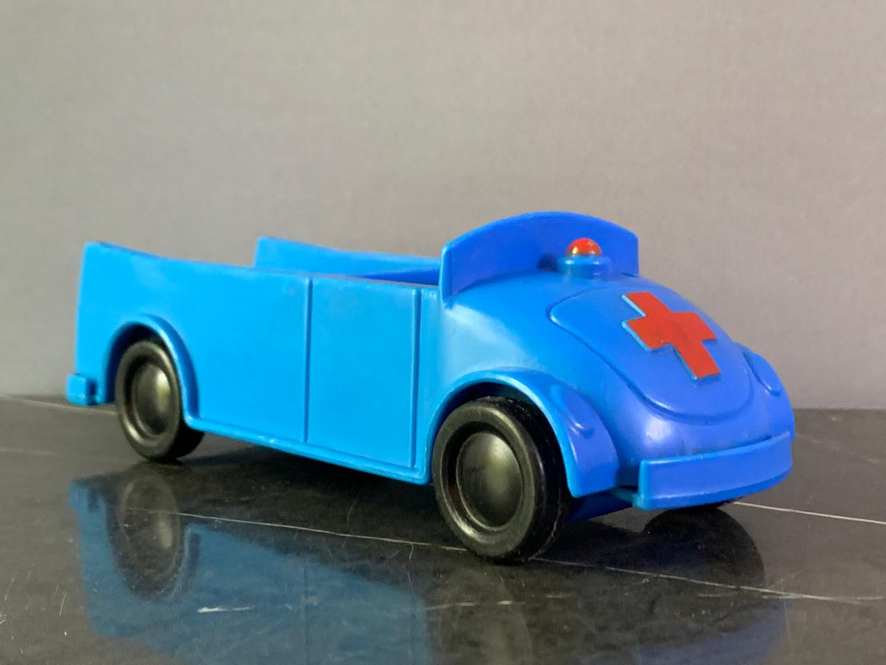 Playskool Richard Scarry Puzzletown Ambulance Toy.