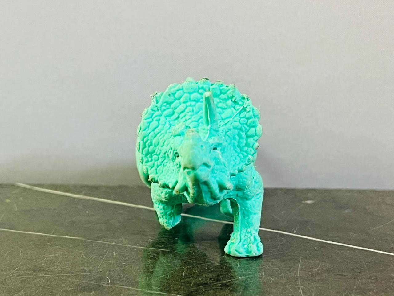 Triceratops Dinosaur Figurine. (foot broken)