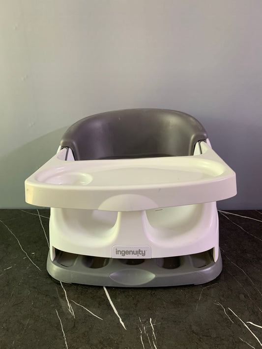 Ingenuity Baby Base 2-in-1 Booster Feeding & Floor Seat with Self-Storing Tray. (Rs 500 advance) (without belts)