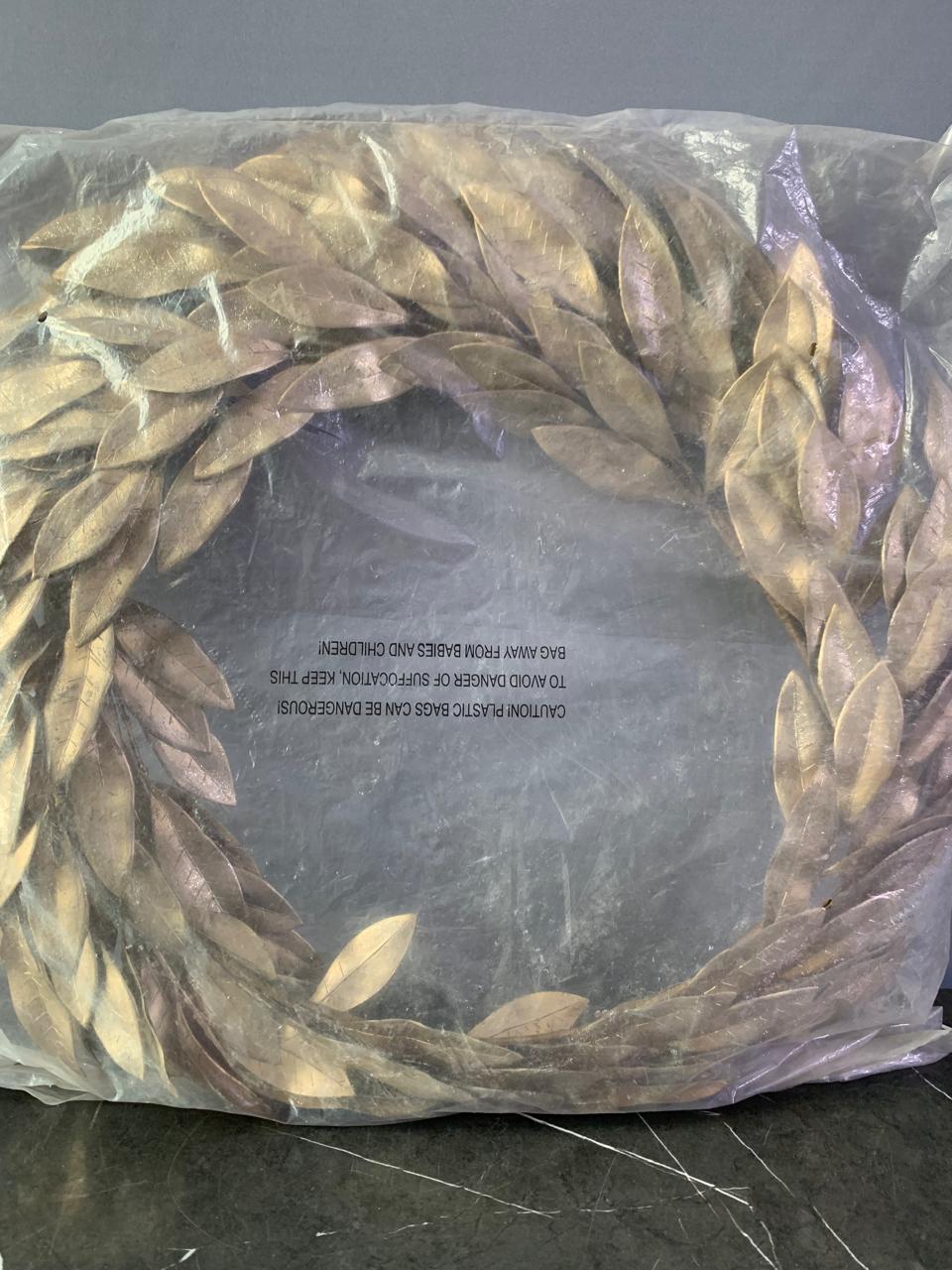 Mixed Metal Wreath with Leaves. (Rs 350 advance)