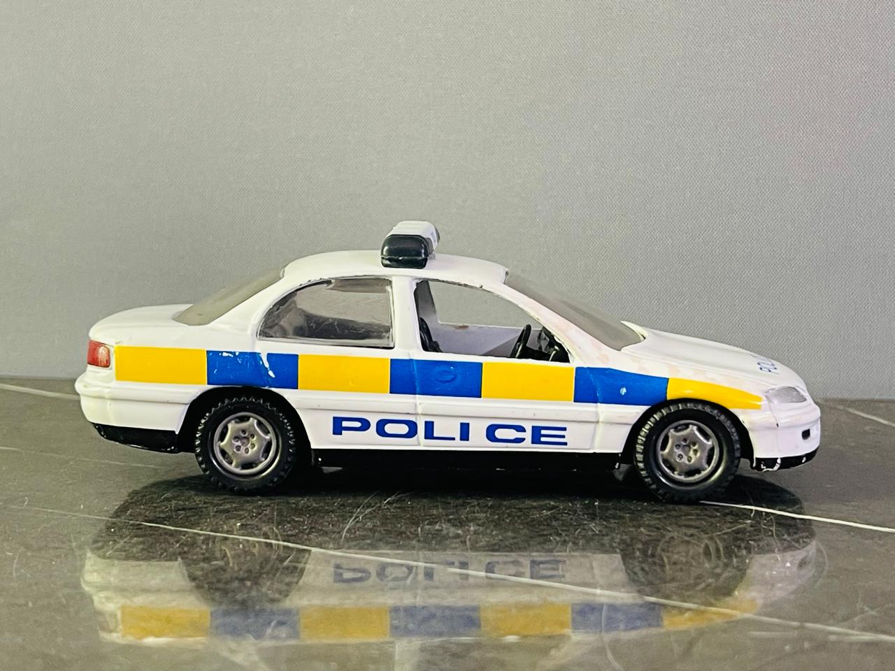Hamleys Metallic Police Car Toy.
