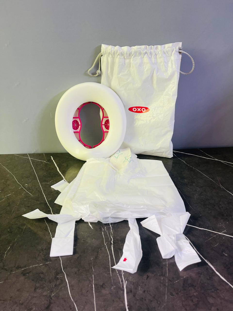 OXO Tot 2-in-1 Go Potty. (New)(Rs 300 advance)
