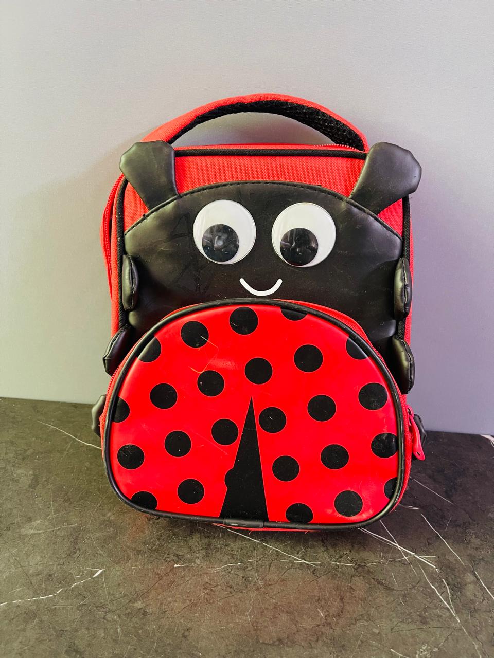 Harry Bear Ladybug Backpack. (Rs 300 advance)