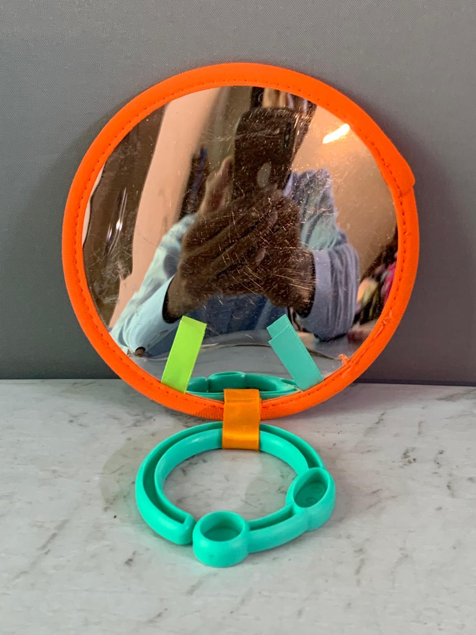 Bright Starts Take-Along Baby-Safe Activity Mirror.